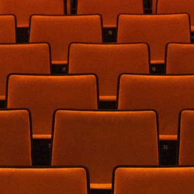 Orange seats in an empty venue